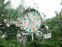 Photograph of whirligigs by Vollis Simpson in Vollis Simpson Park, Lucama in Wilson County, N.C.  Image by the NC ECHO Project, North Carolina Department of Cultural Resources, taken August 18, 2002.  Presented on NC Digital Collections. 